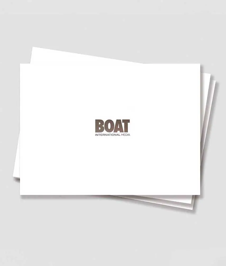 Boat International Media pack front cover featuring a silver foil logo.